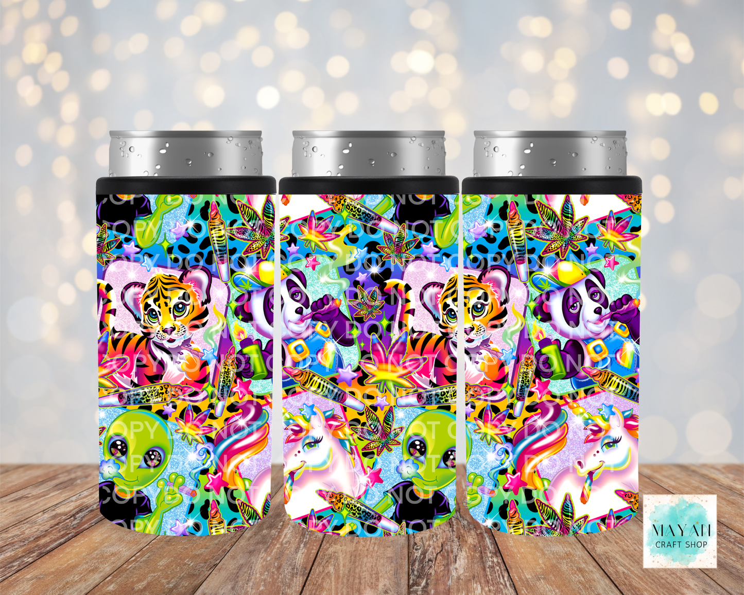 Three colorful tumblers with a vibrant design on a wooden surface.