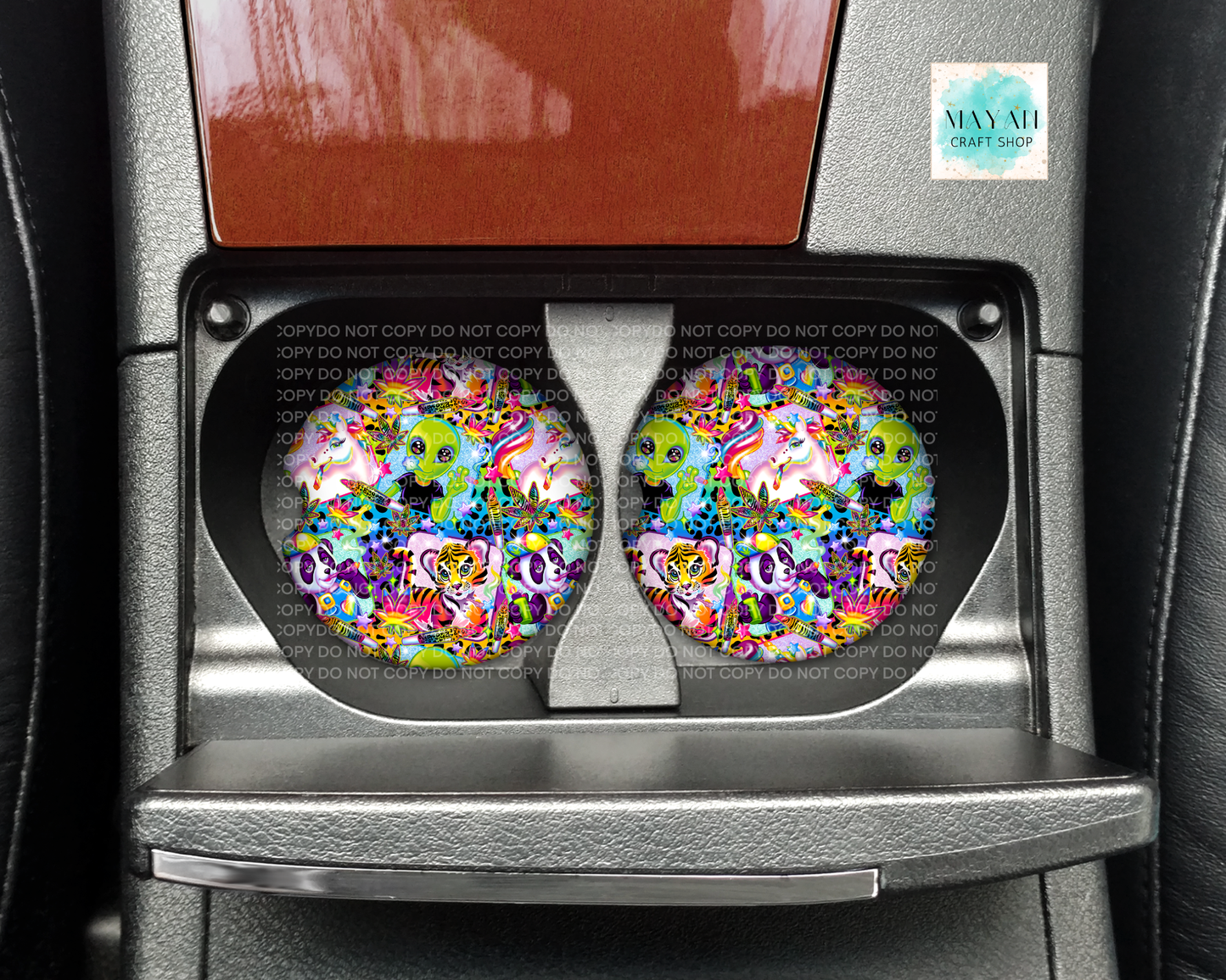 Colorful skull design coasters in a car cup holder.