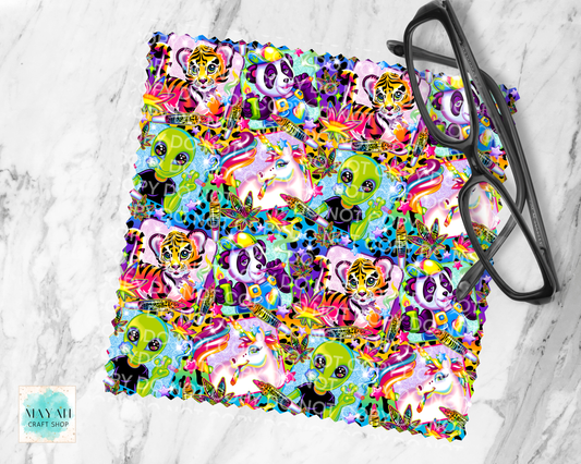 Colorful fabric with animal patterns on a white surface with glasses.