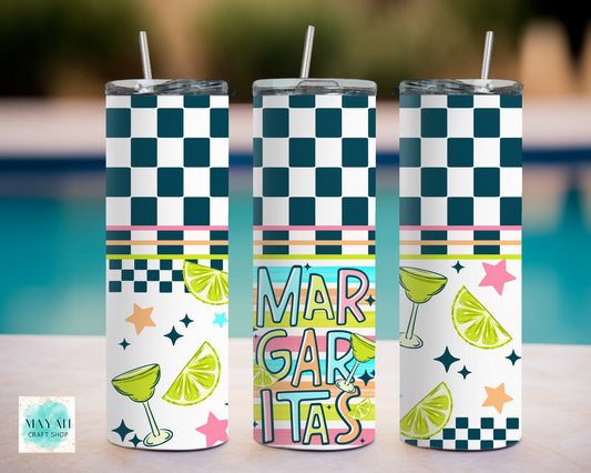 Three colorful tumblers with checkered patterns and 'Margaritas' text on a blurred outdoor background.