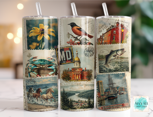 Three cylindrical tumbler with vintage-style illustrations on a blurred background