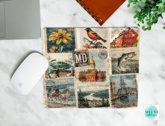 Mouse pad with vintage-style collage cover on a marble surface