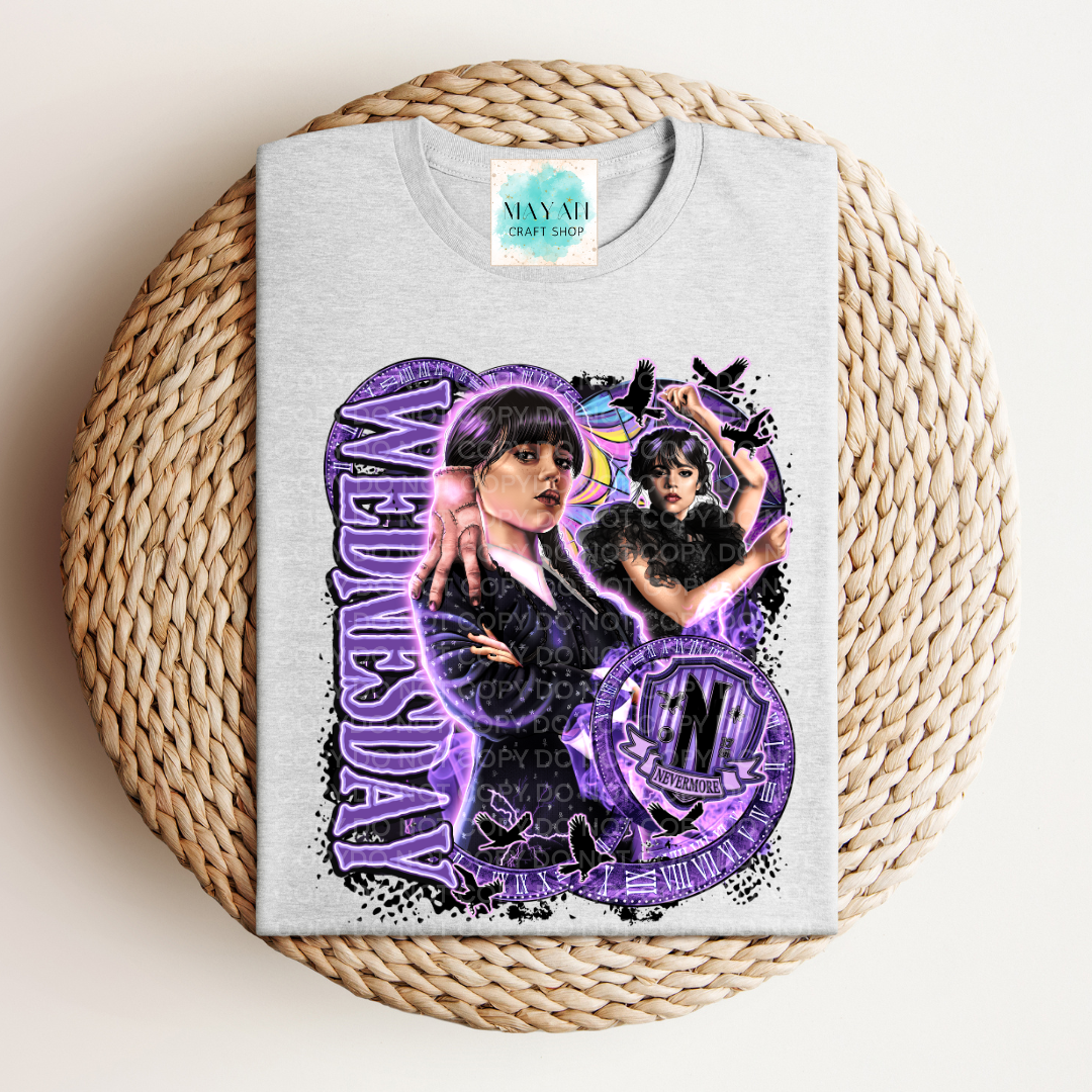 Gray t-shirt with a graphic design of two people on a woven mat.