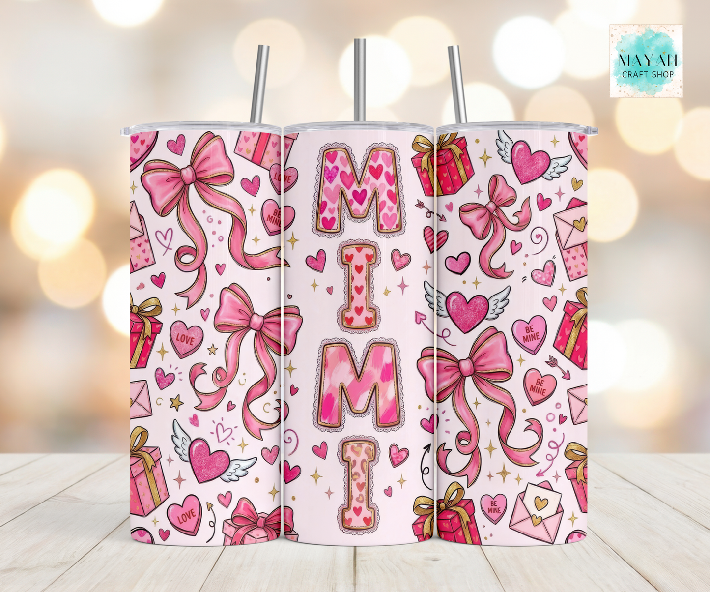 Pink and white tote bag with 'MIMI' design on a blurred background