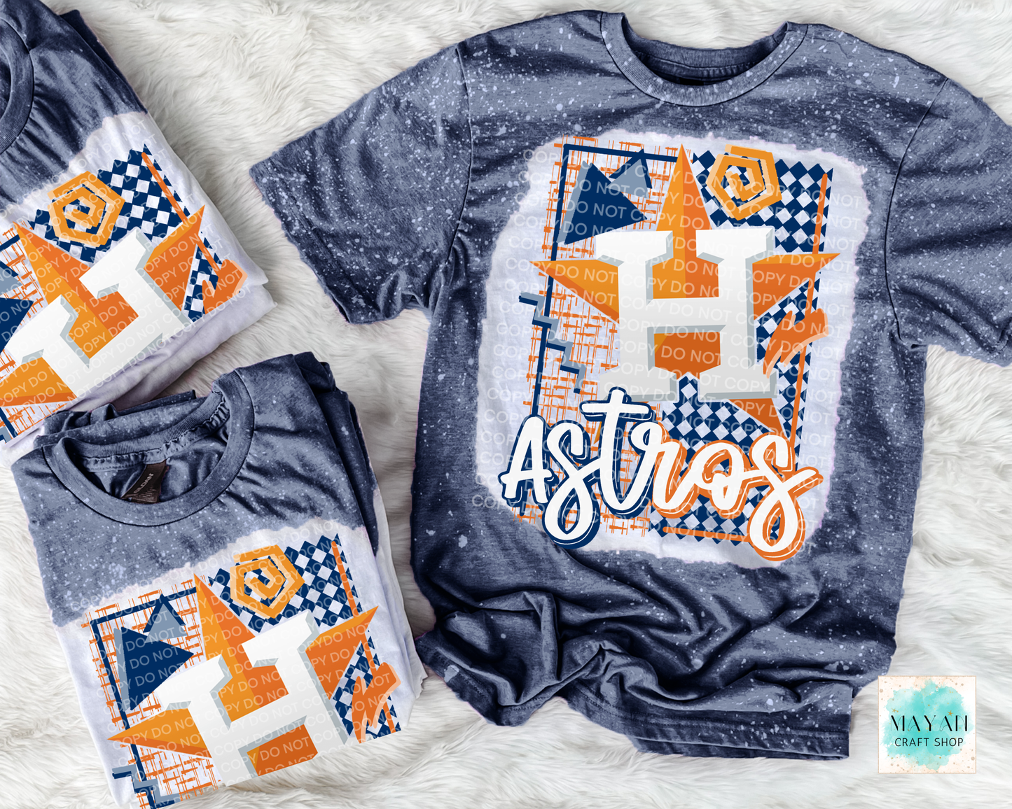 Two blue t-shirts with baseball design on a white background