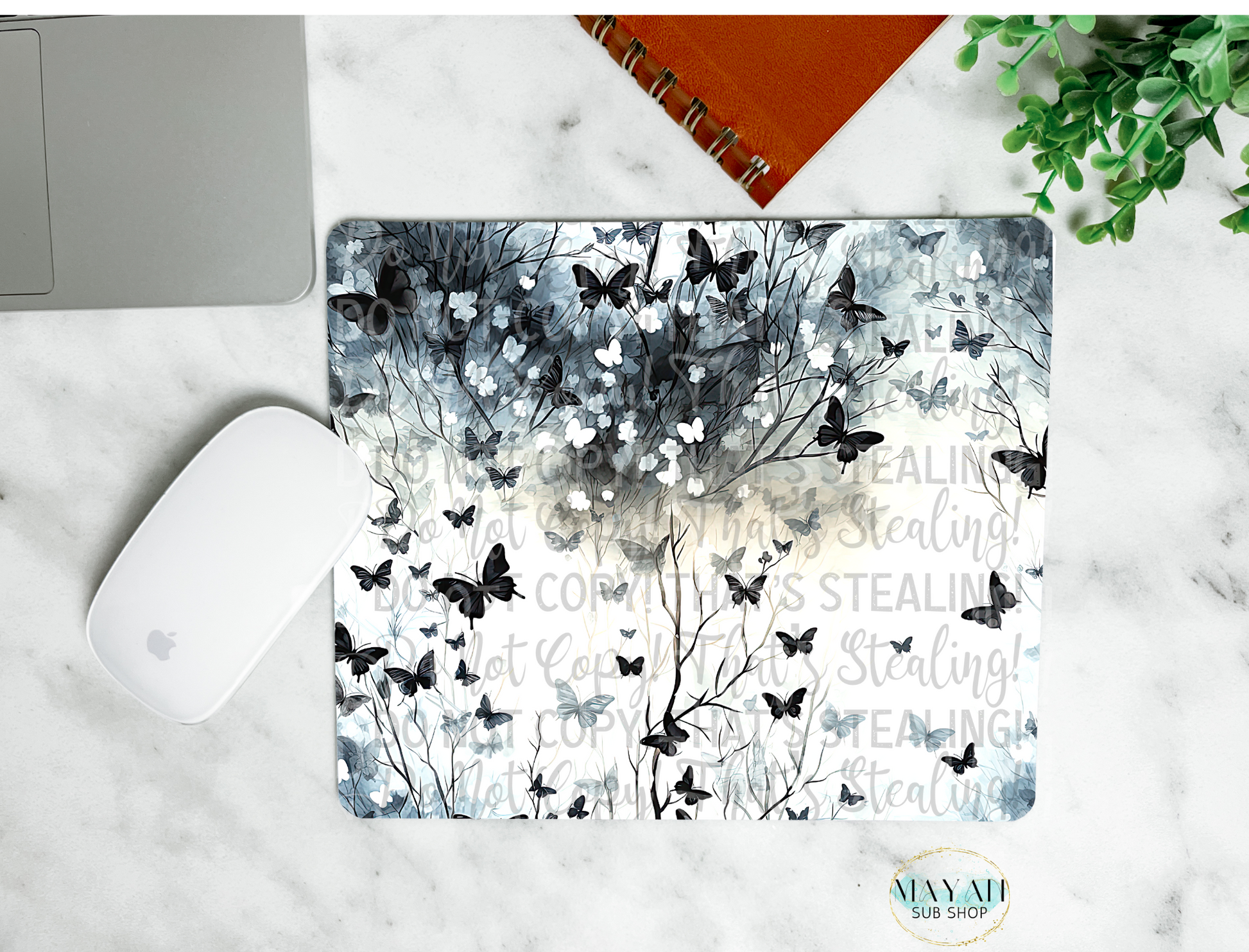 Navy butterflies mouse pad. -Mayan Sub Shop