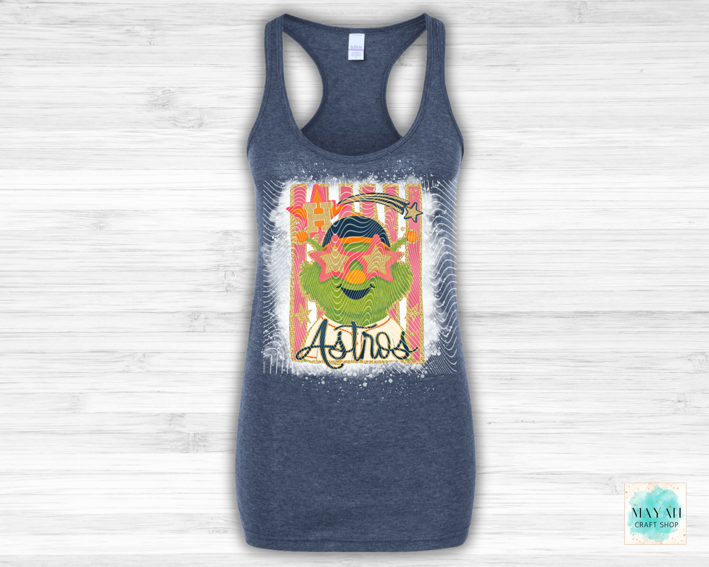Navy blue tank top with colorful graphic design on a light wooden background