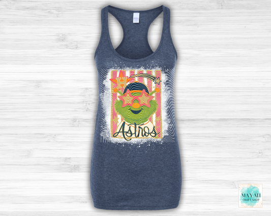 Navy blue tank top with colorful graphic design on a light wooden background