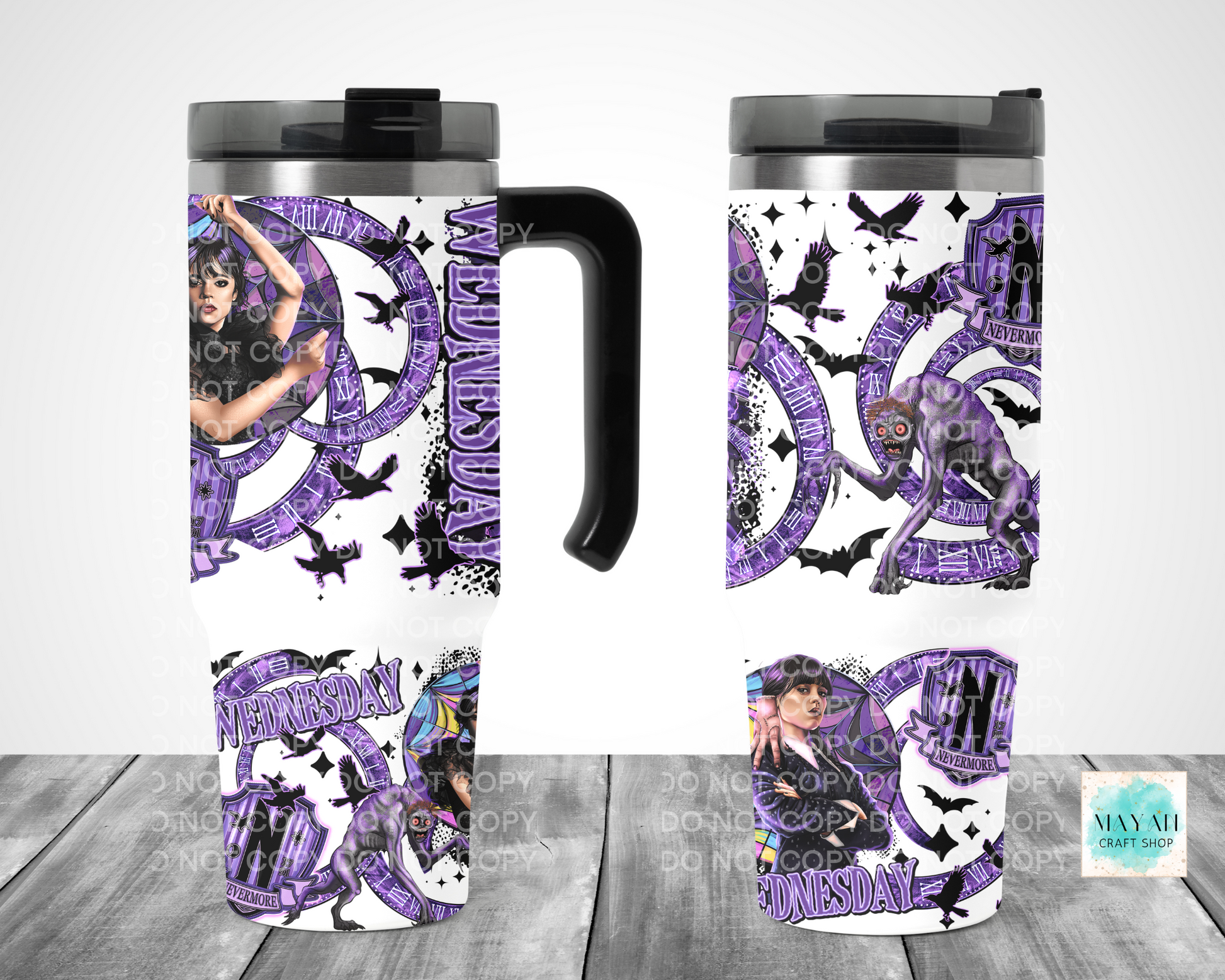 Travel mug with purple and black design on a white background