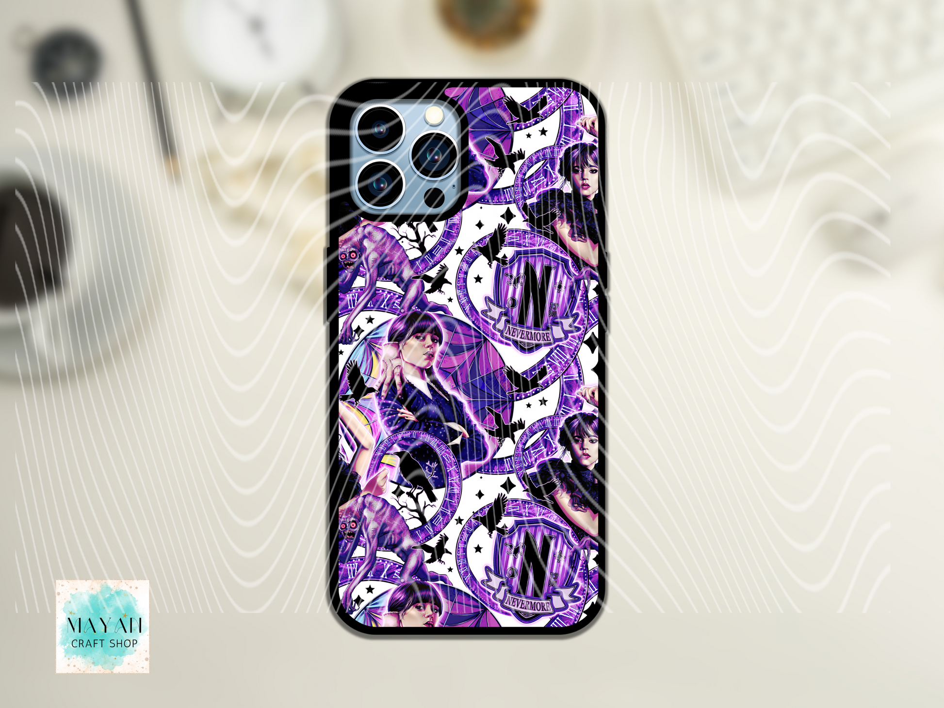 Phone case with purple and black design on a white background