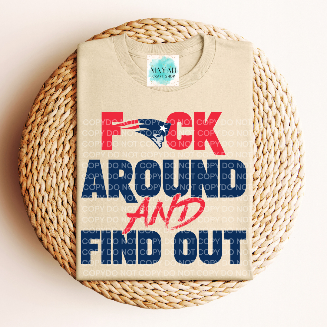 Sand t-shirt with colorful text and logo on a woven surface
