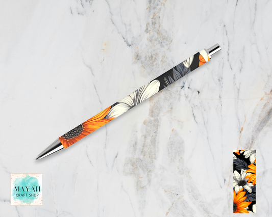 Orange black daisies pen.