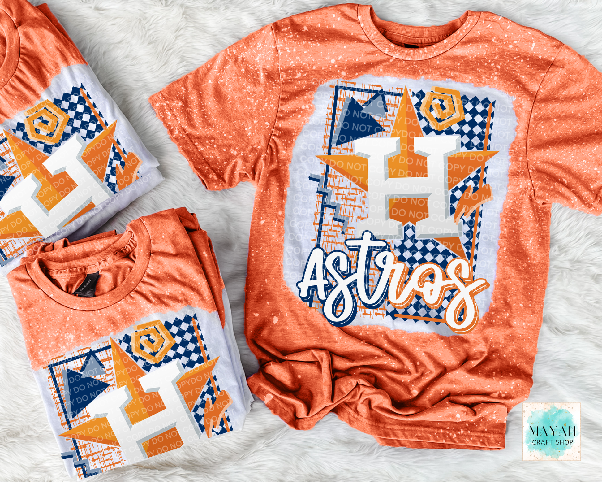 Orange t-shirt with baseball design on a light gray background