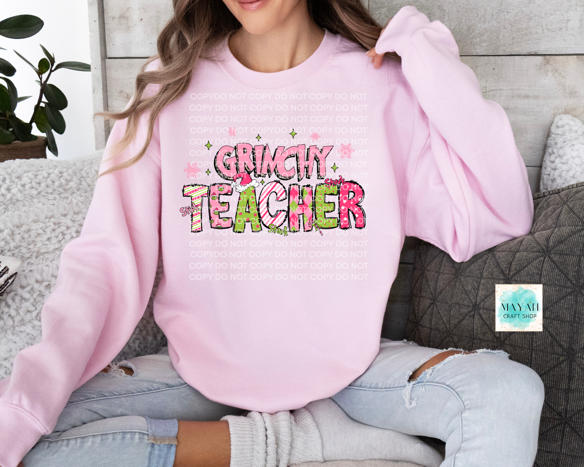 Grinchy teacher pink sweatshirt. -Mayan Craft Shop