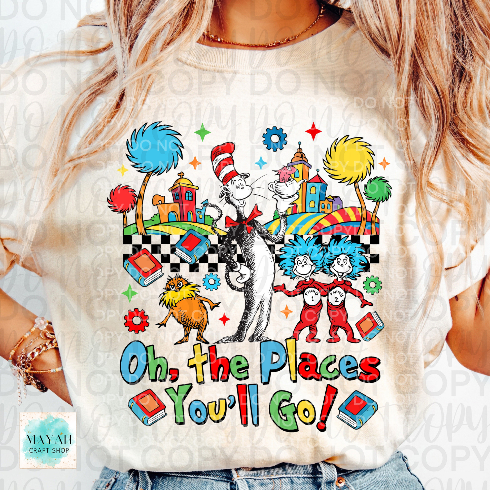 Person wearing a t-shirt with reading design featuring characters.