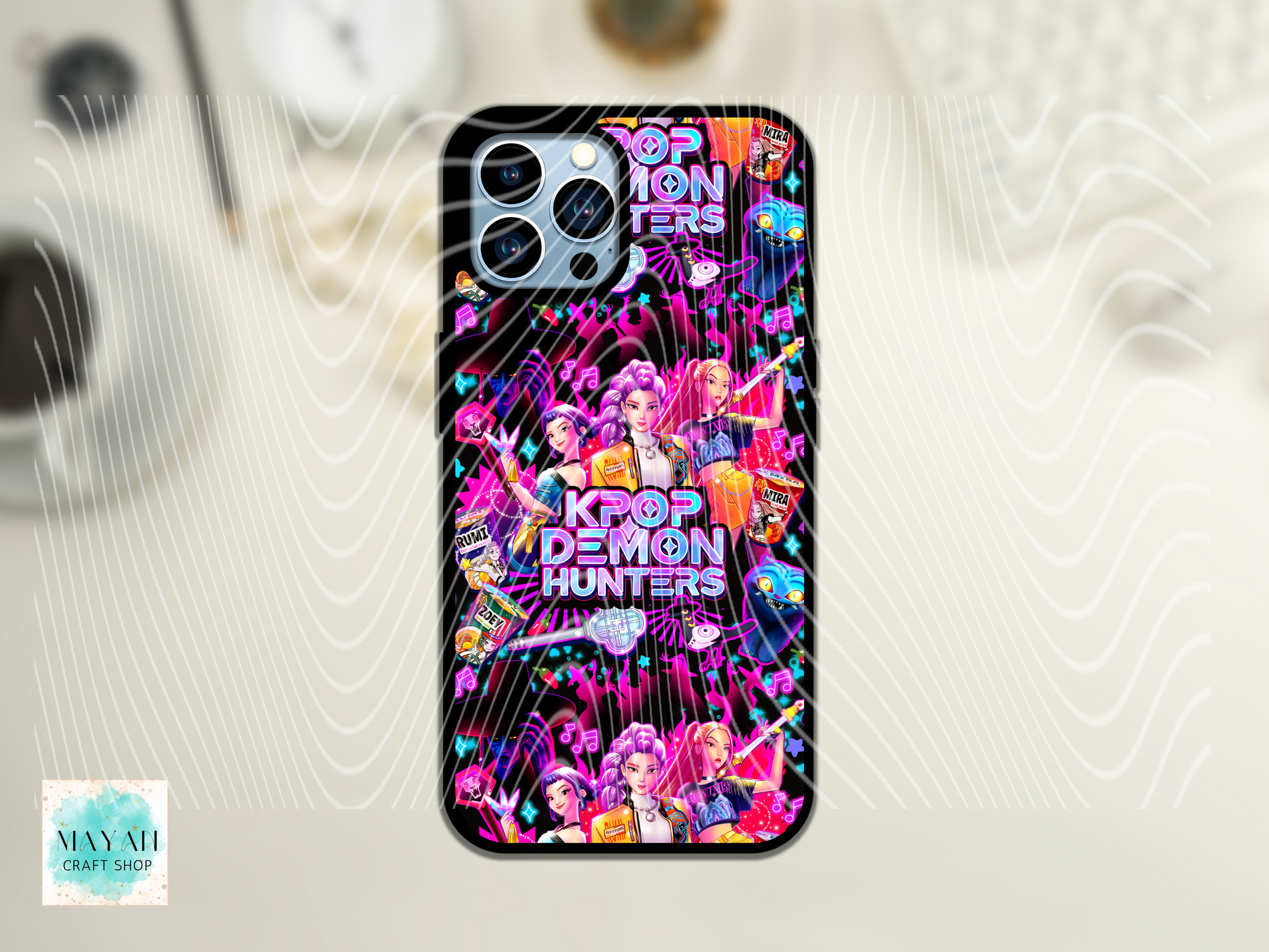 Phone case with colorful design and text on a light gray background