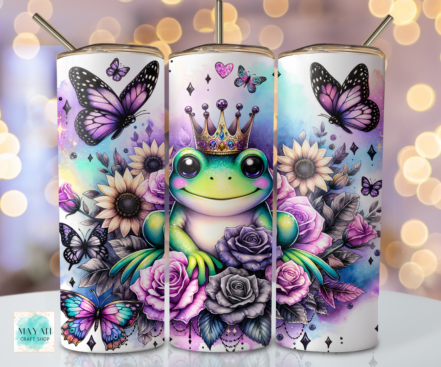 Three tumbler designs featuring a frog, flowers, and butterflies on a blurred bokeh background.