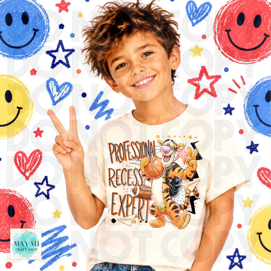 A smiling young boy wearing a white graphic t-shirt with a cartoon and the text 'PROFESSIONAL REGRESS EXPERT'. The background is white with colorful faces, stars, and hearts, and has a faint watermark overlay.