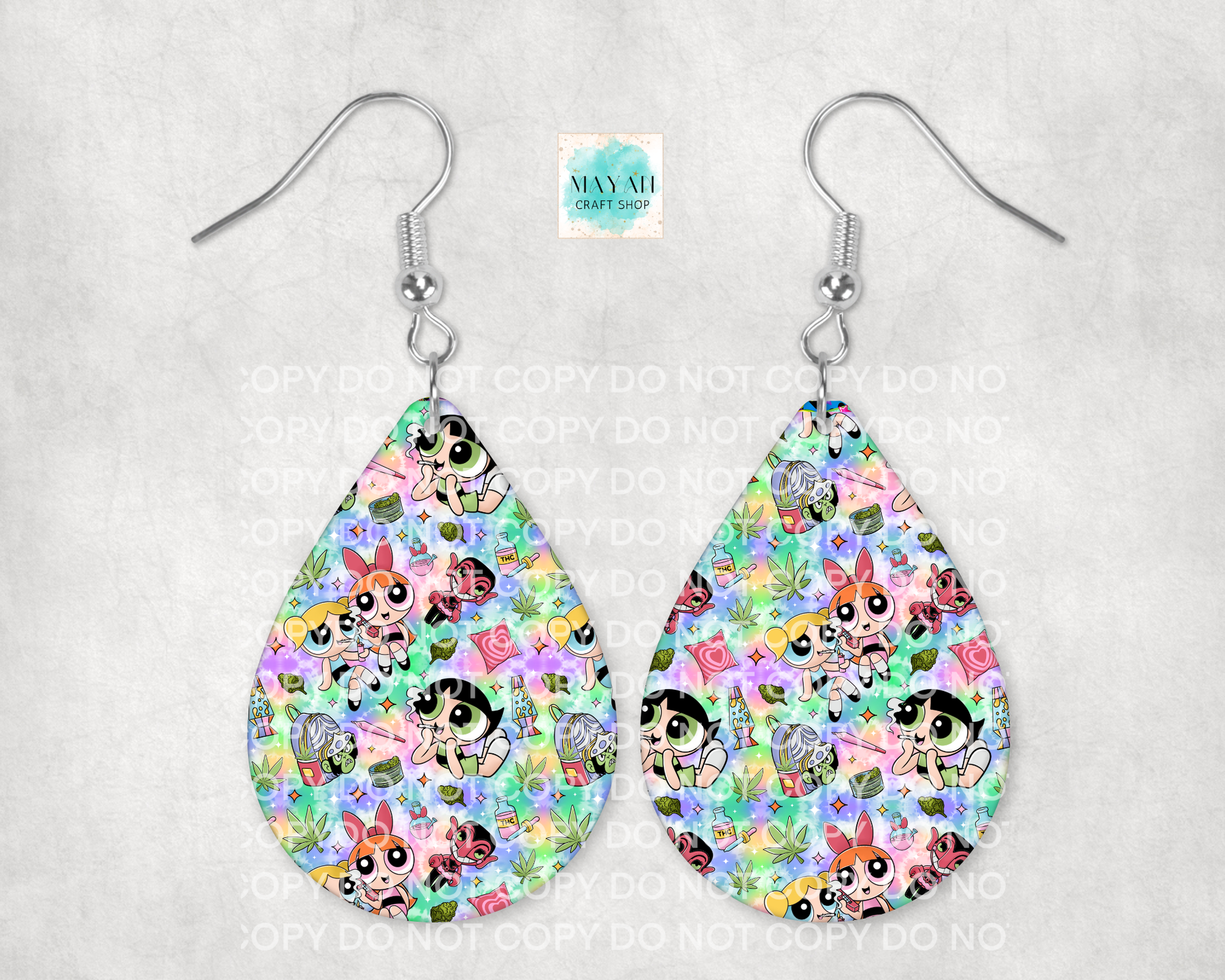 Teardrop-shaped earrings with colorful character pattern on a light gray background