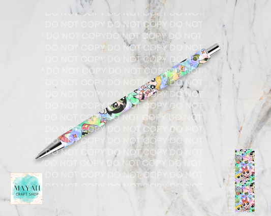 Decorative pen with floral design on a marble surface.