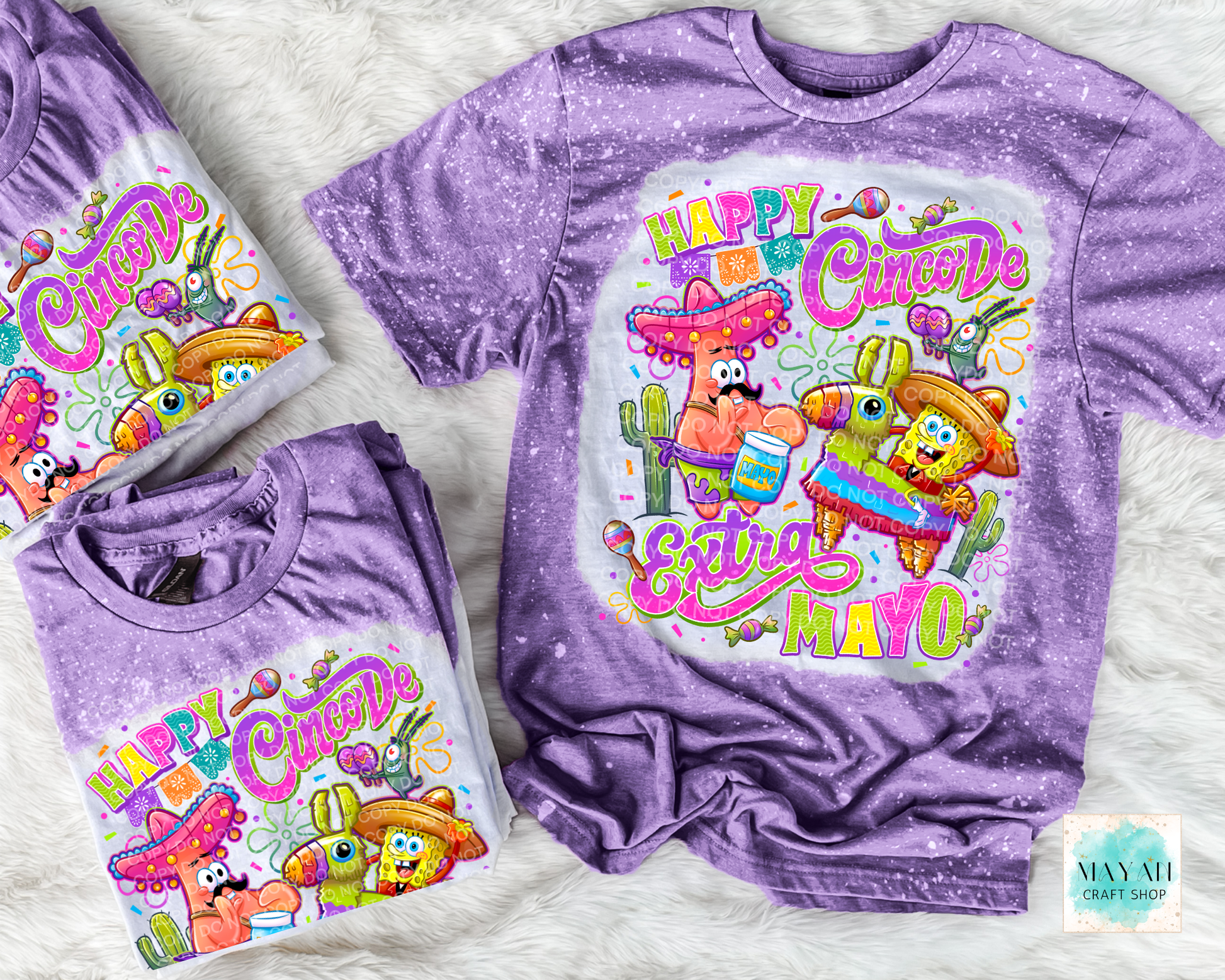 Purple t-shirt with colorful 'Happy Cinco de Mayo' design featuring cartoon characters and text.