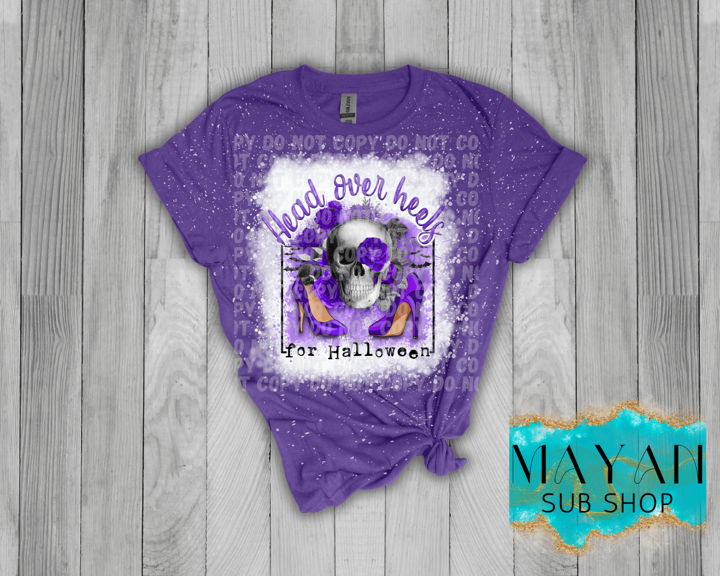 Head over heels for Halloween in heather purple bleached shirt. -Mayan Sub Shop