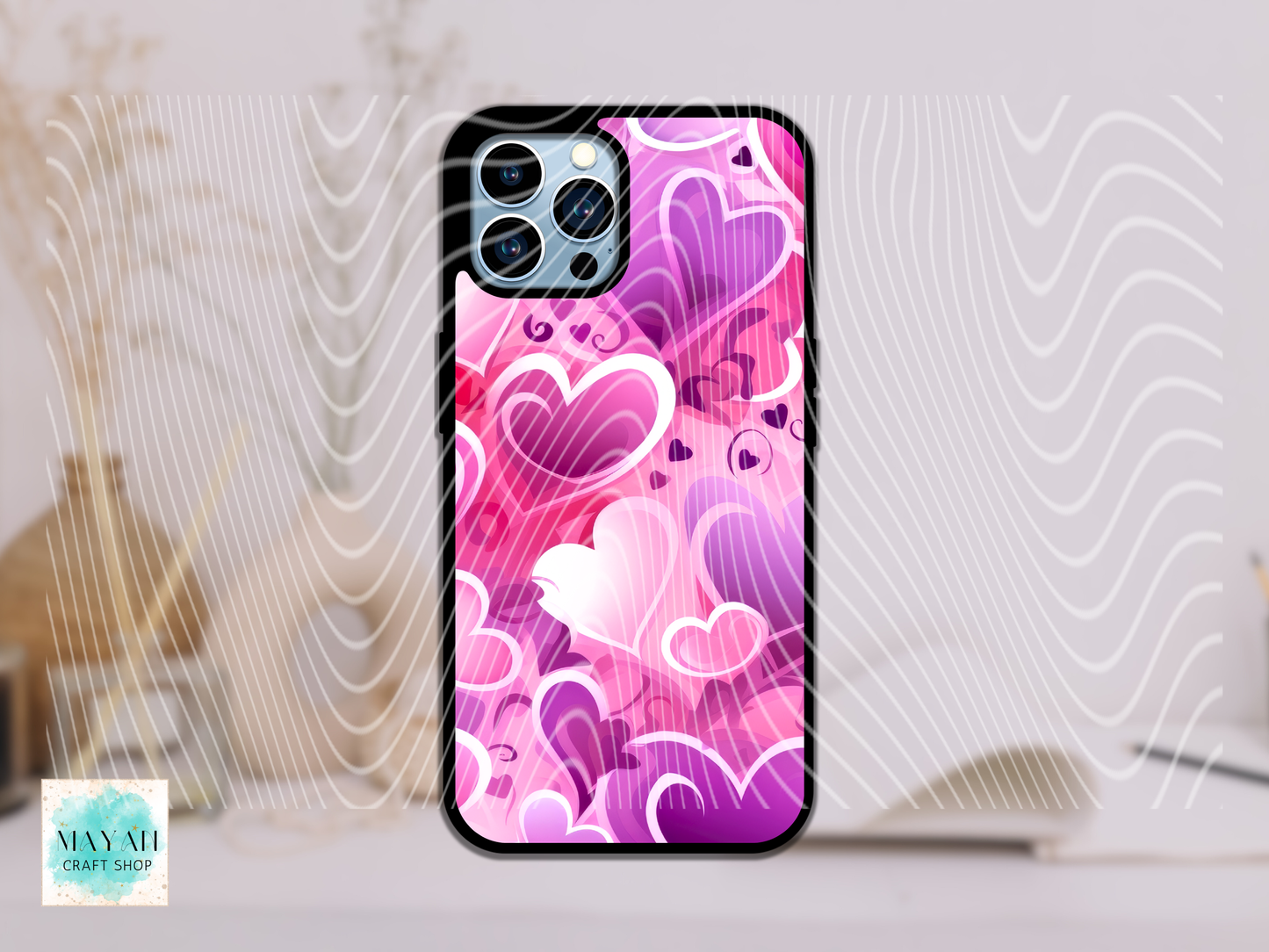 Phone case with heart pattern on a light background