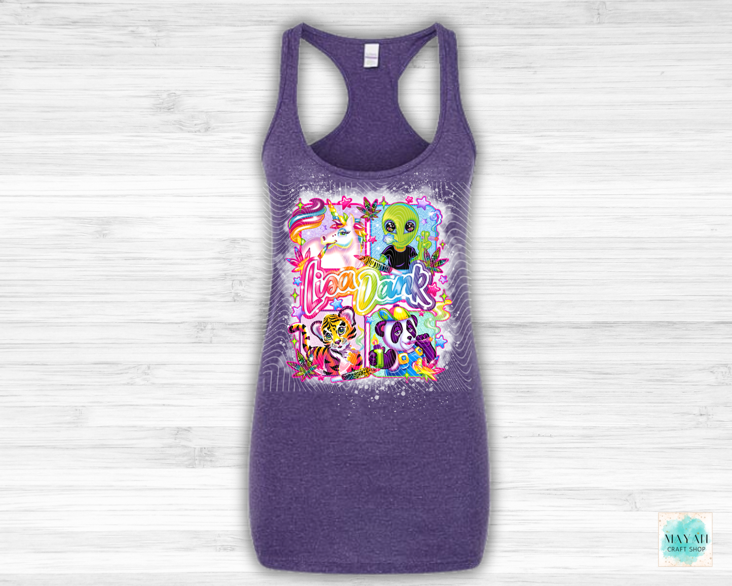 Purple tank top with colorful graphic design on a light wooden background