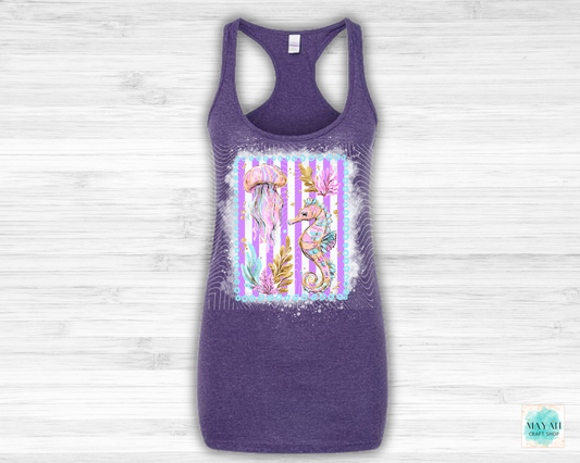 Purple tank top with a colorful seahorse design on a white background