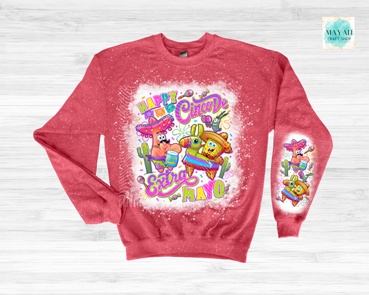 Red sweatshirt with colorful 'Happy Cinco de Mayo' design on a light gray background