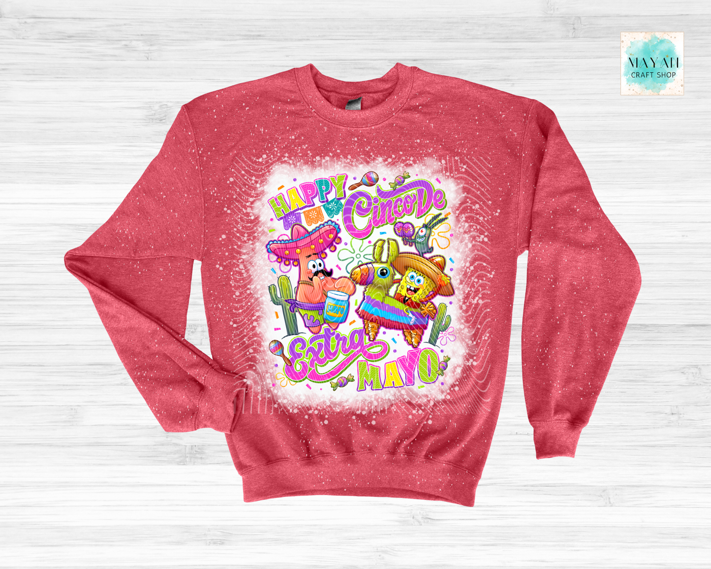 Red sweatshirt with colorful Cinco de Mayo design on a white background