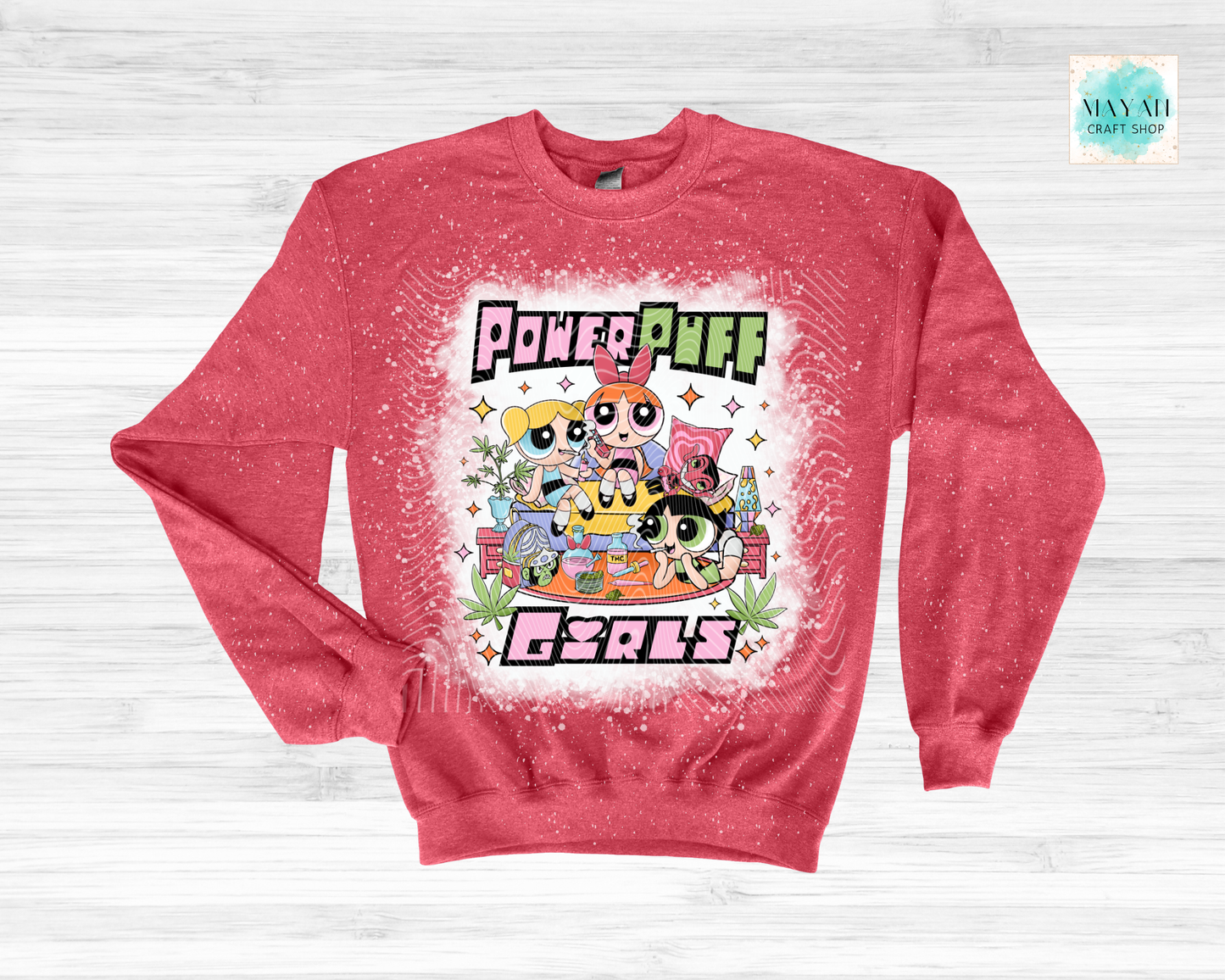 Red sweatshirt with vibrant graphic on a white background