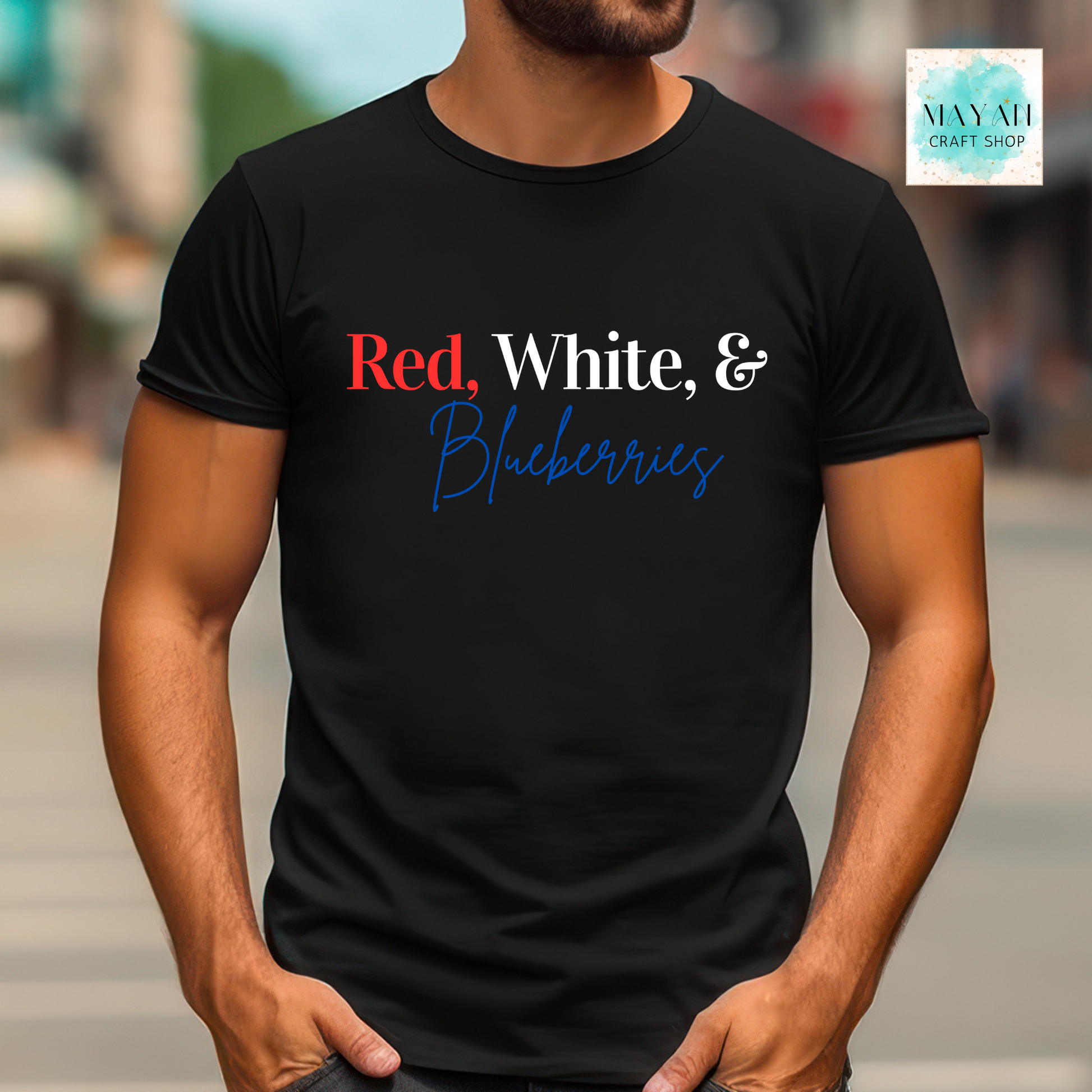 Person wearing a black t-shirt with 'Red, White & Blueberries' text.