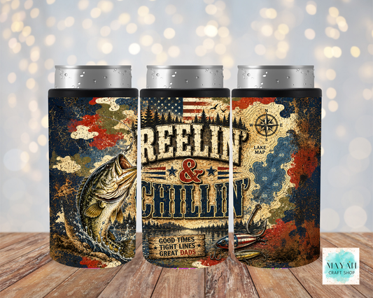 Three cylindrical coolers with 'Reeling & Chillin' design on a wooden surface.