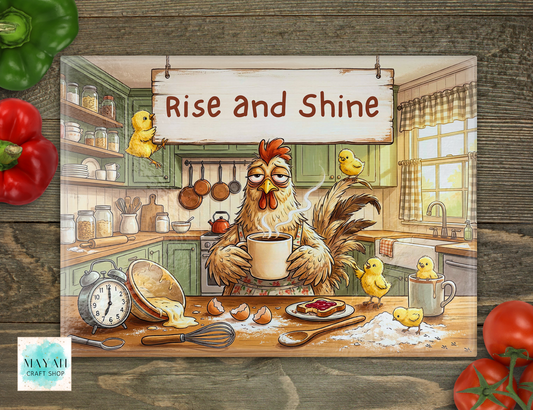 Cartoon rooster in a kitchen with chicks and 'Rise and Shine' sign, surrounded by vegetables on a wooden surface.
