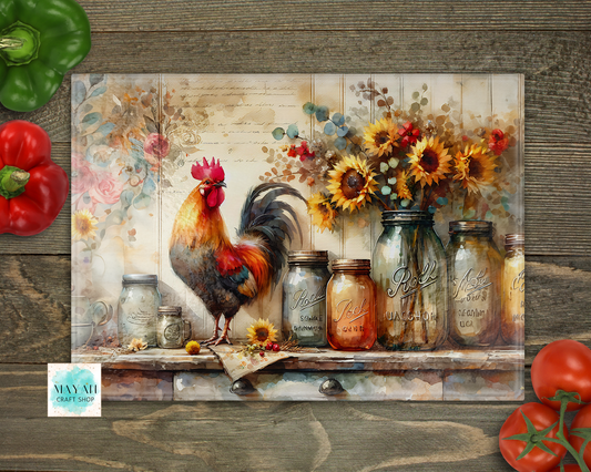 Cutting board with a rooster, flowers, and jars on a rustic wooden background.