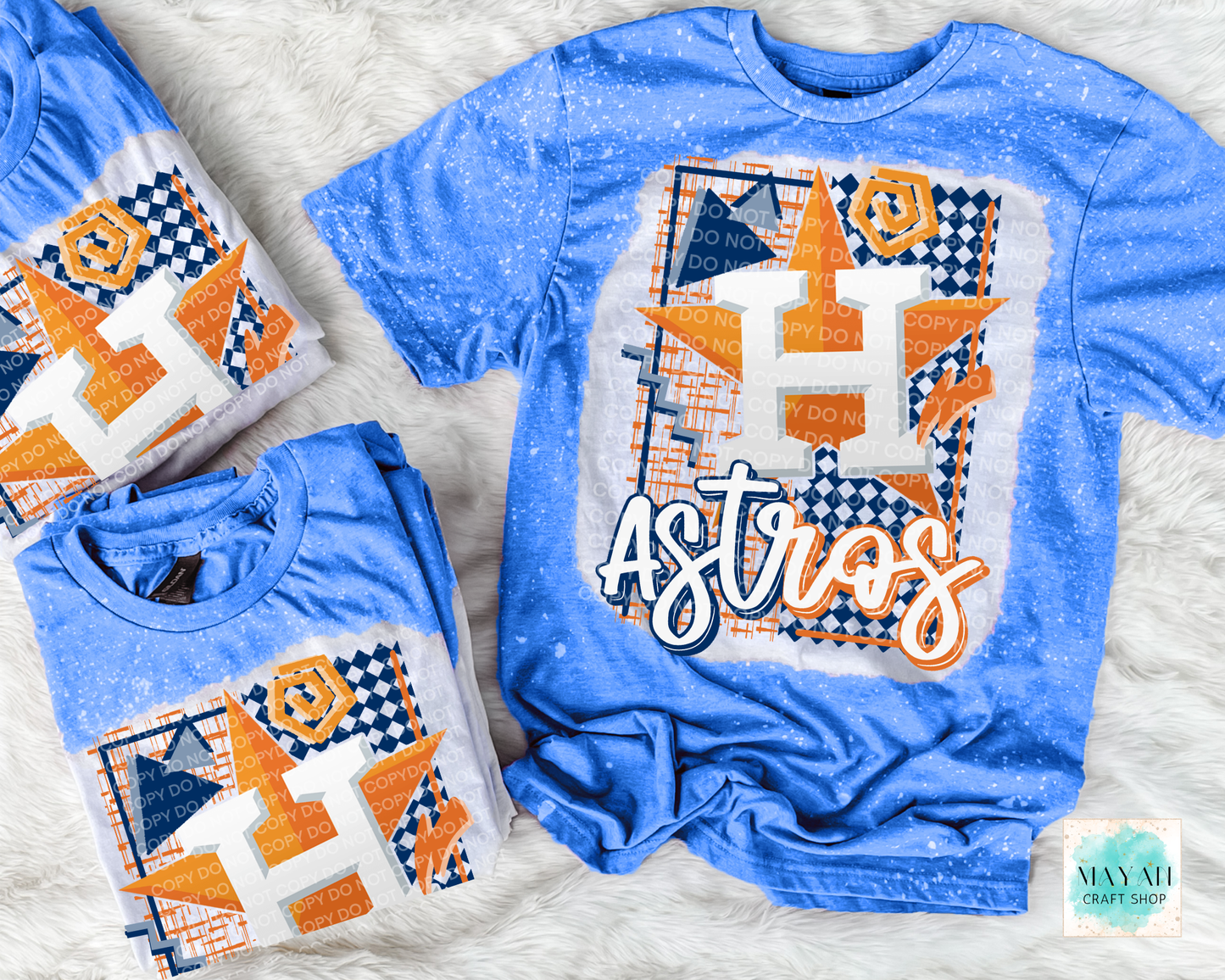 Blue t-shirt with baseball graphic design on a textured surface