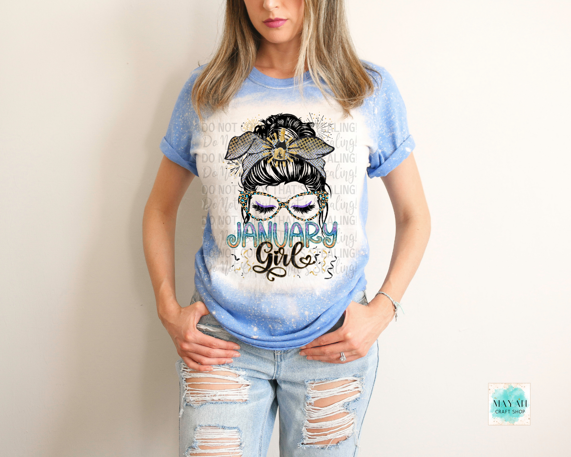 January girl heather royal blue bleached tee. -Mayan Craft Shop