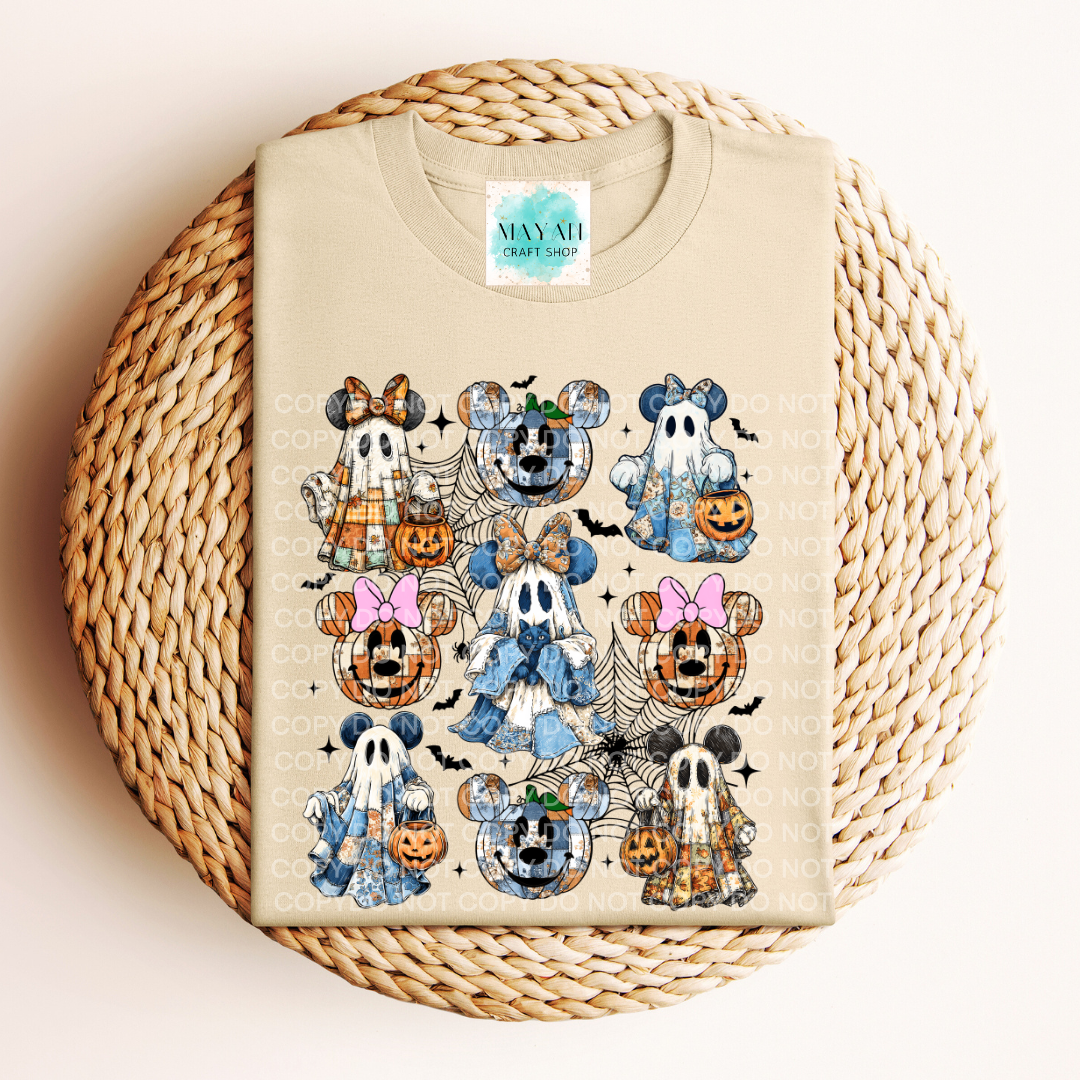 Beige t-shirt with Halloween-themed cartoon characters on a woven surface