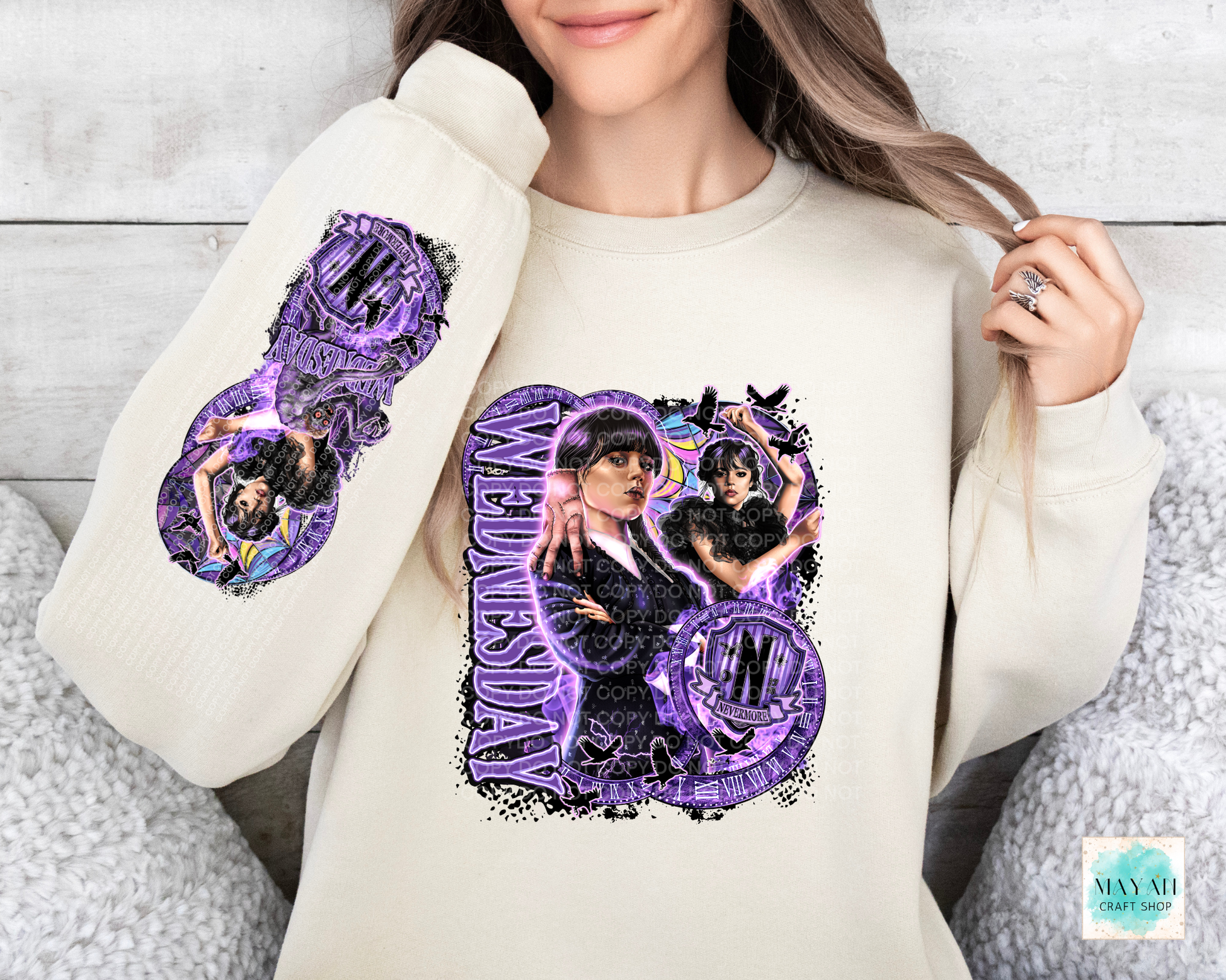 Purple design in sand sweatshirt with sleeve design.