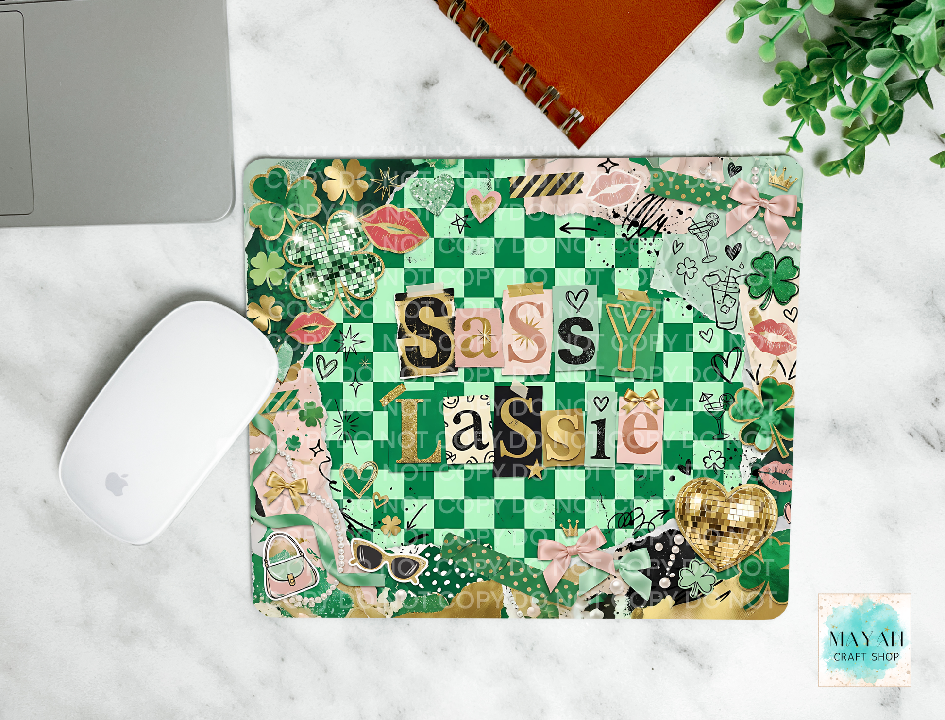 Decorative mouse pad skin with 'Sassy Lassie' text on a marble surface.