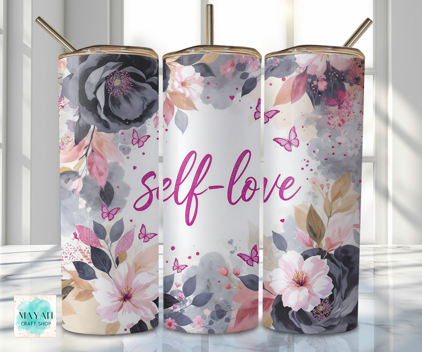 Three floral tumblers with 'self-love' text on a light background