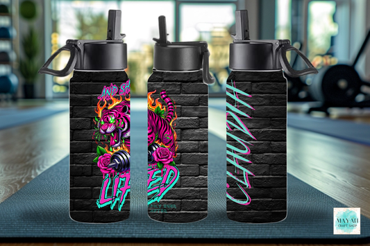 She lifted water bottle. -Mayan Craft Shop