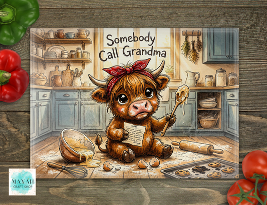 Cartoon cow in a kitchen with baking tools and text 'Somebody Call Grandma'.