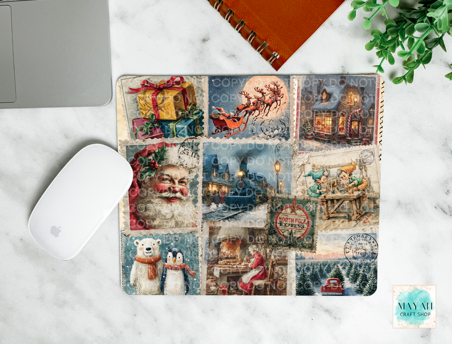 Decorative mouse pad with vintage-style Christmas design on a marble surface.