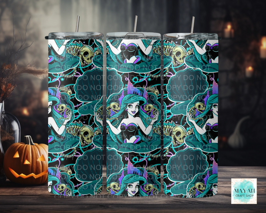 Halloween-themed tumbler with mermaid design and skull elements on a dark background.
