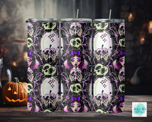 Three tumbler cups with Halloween-themed design featuring skulls  on a dark background.