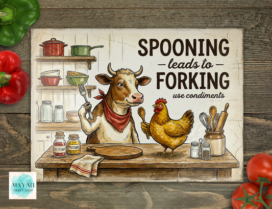 Cartoon cow and chicken in a kitchen setting with text 'Spoon leads to Forking use condiments' on a rustic wooden background.