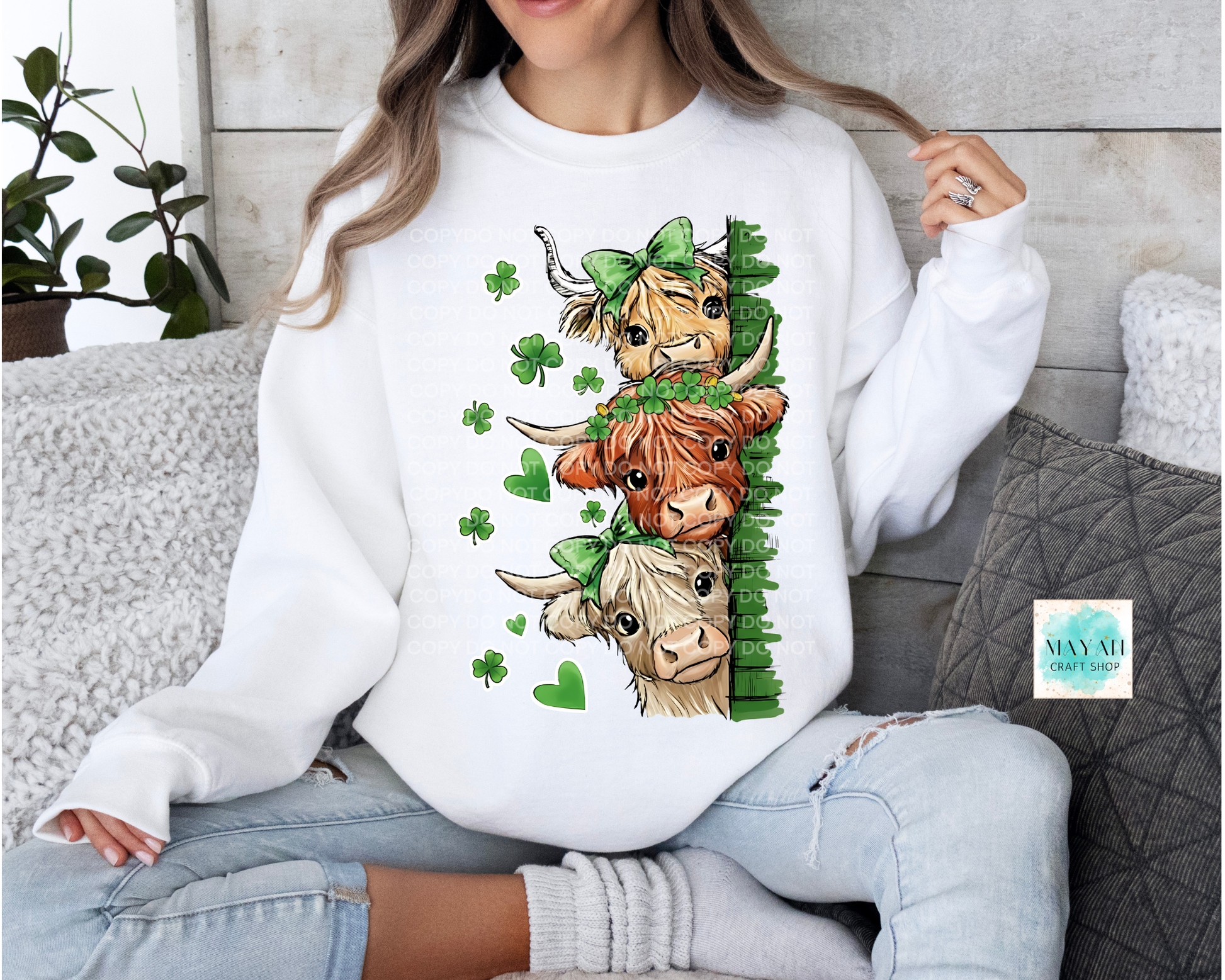 St. Patrick's highland cow sweatshirt.