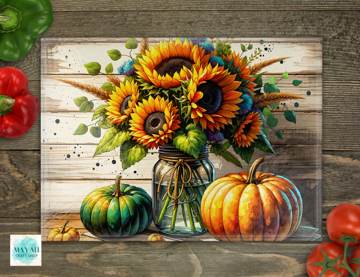 Sunflower pumpkins cutting board.